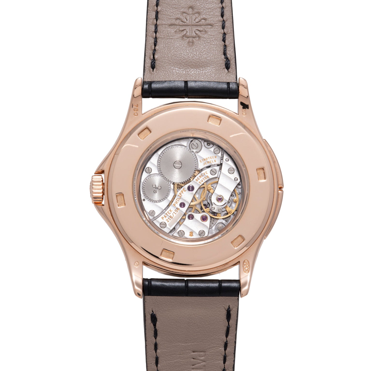 Rose gold watch with exposed mechanical movement visible through case back, black leather strap with cross emblem.
