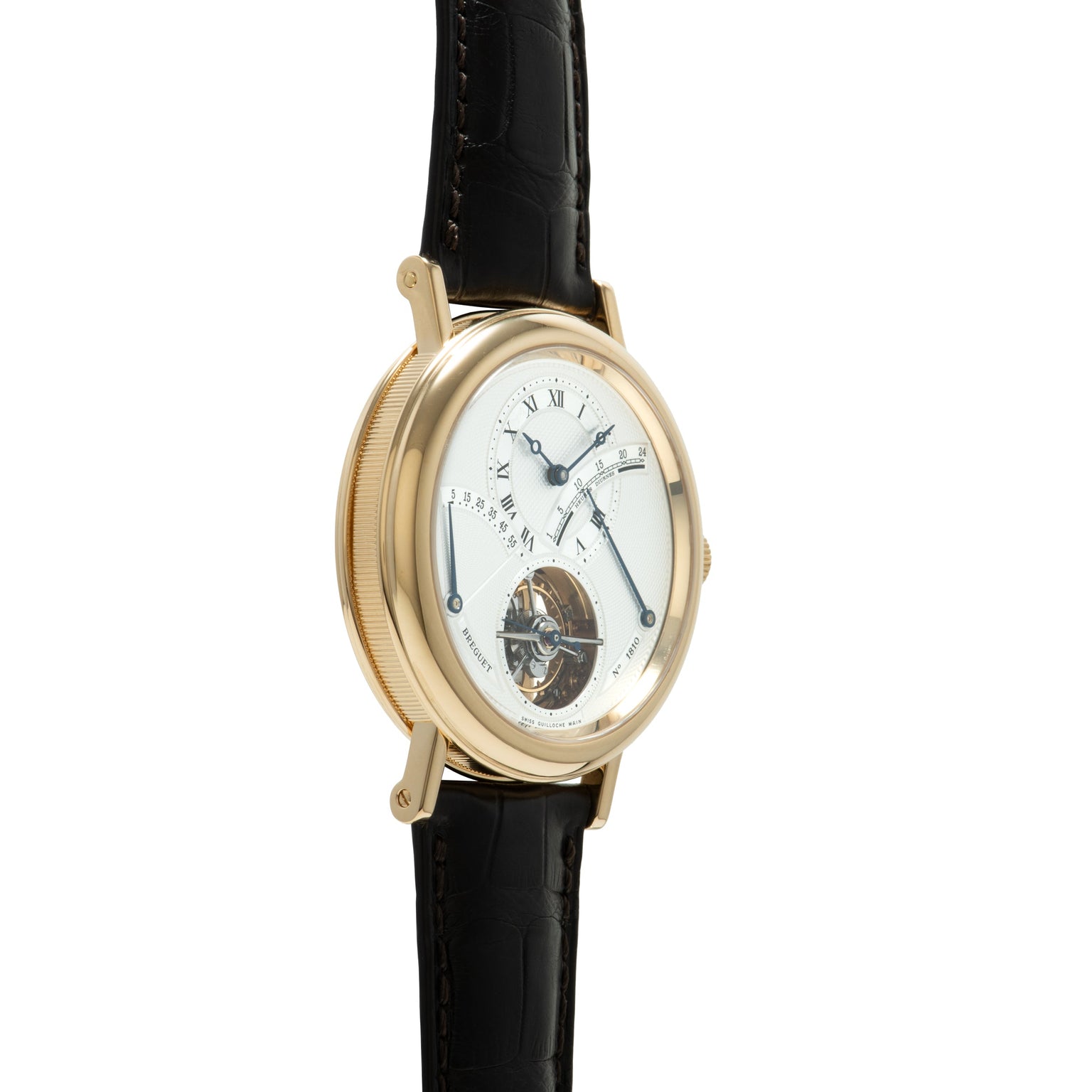 Gold-tone watch with white dial, Roman numerals, visible tourbillon at 6 o'clock, and black leather strap.