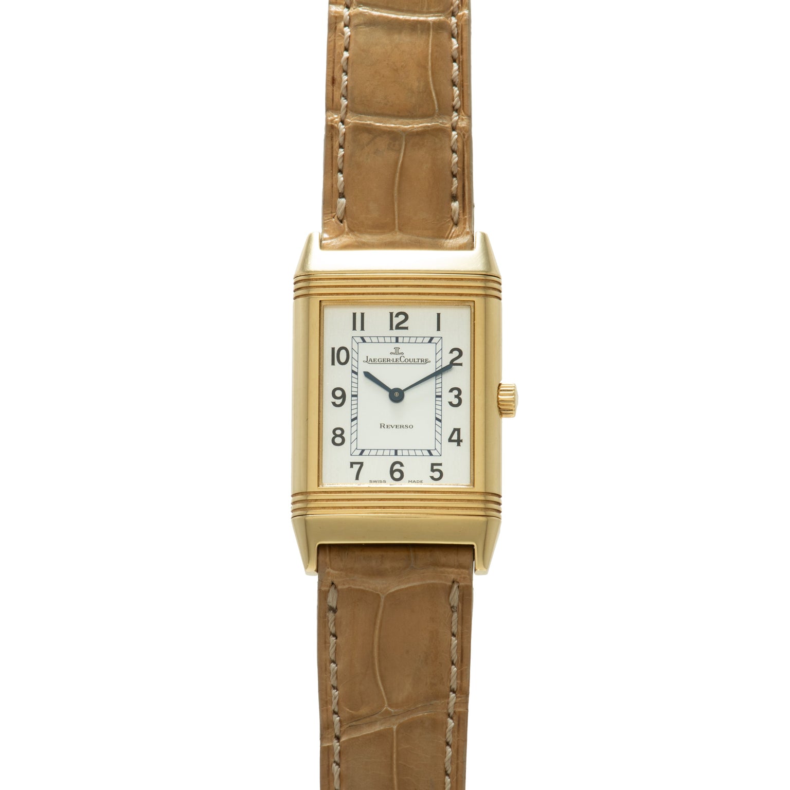 Gold-tone rectangular watch with white dial, Arabic numerals, and tan leather strap with white stitching.