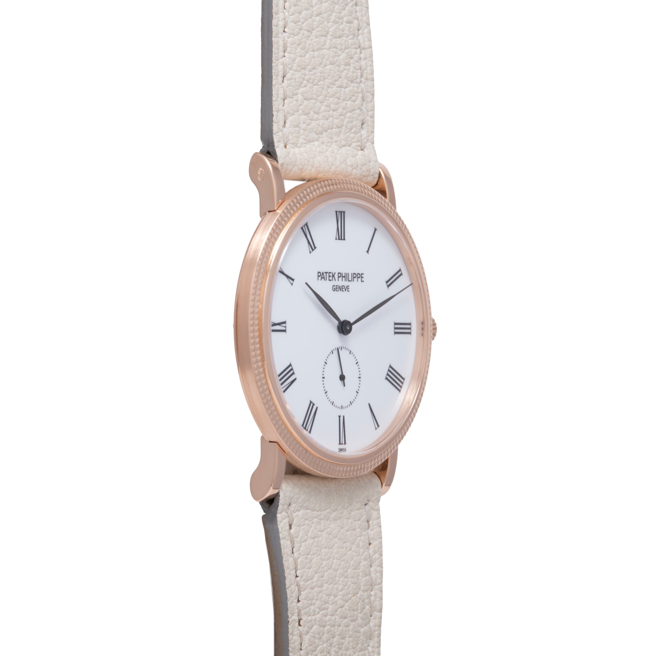 Rose gold oval watch with white dial, Roman numeral markers, subdial, and cream leather strap.