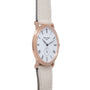Rose gold oval watch with white dial, Roman numeral markers, subdial, and cream leather strap.