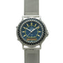 Yema Spationaute ISS watch with dark blue dial, yellow hour markers, rotating bezel, digital display, and stainless steel mes