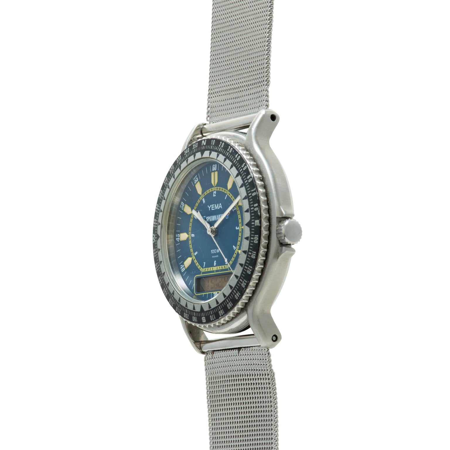 Stainless steel watch with blue dial, gold hour markers, rotating bezel, and mesh band.