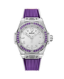 Watch with purple strap and bezel on a green background