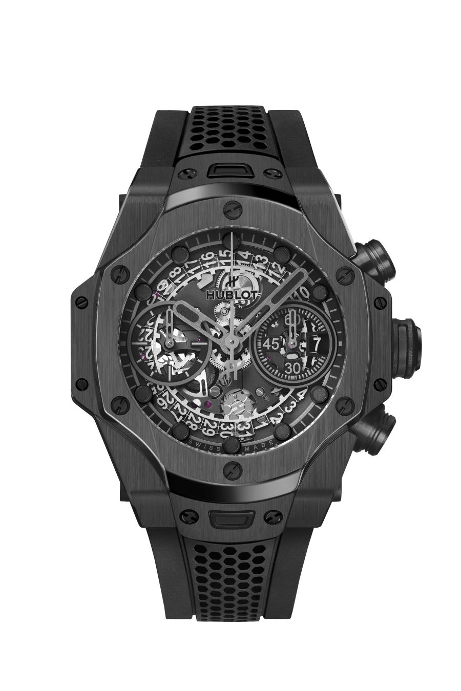 All-black chronograph watch with skeletonized dial, exposed mechanisms, angular case, and perforated rubber strap.