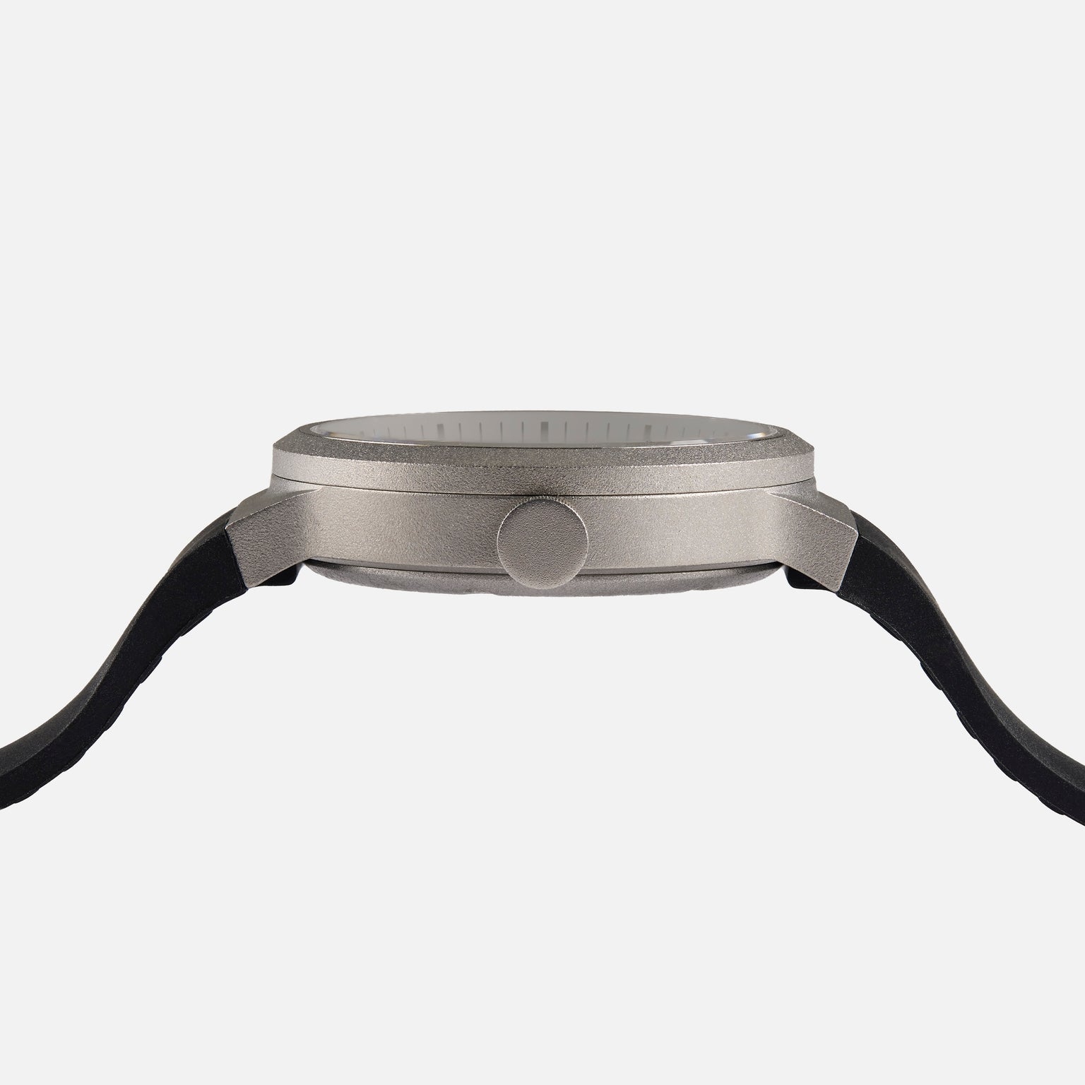 Side view of the Braun BN0279 Sub-Seconds Limited Edition For Hodinkee, featuring a round metallic case and black straps, by Braun, displayed against a white background.