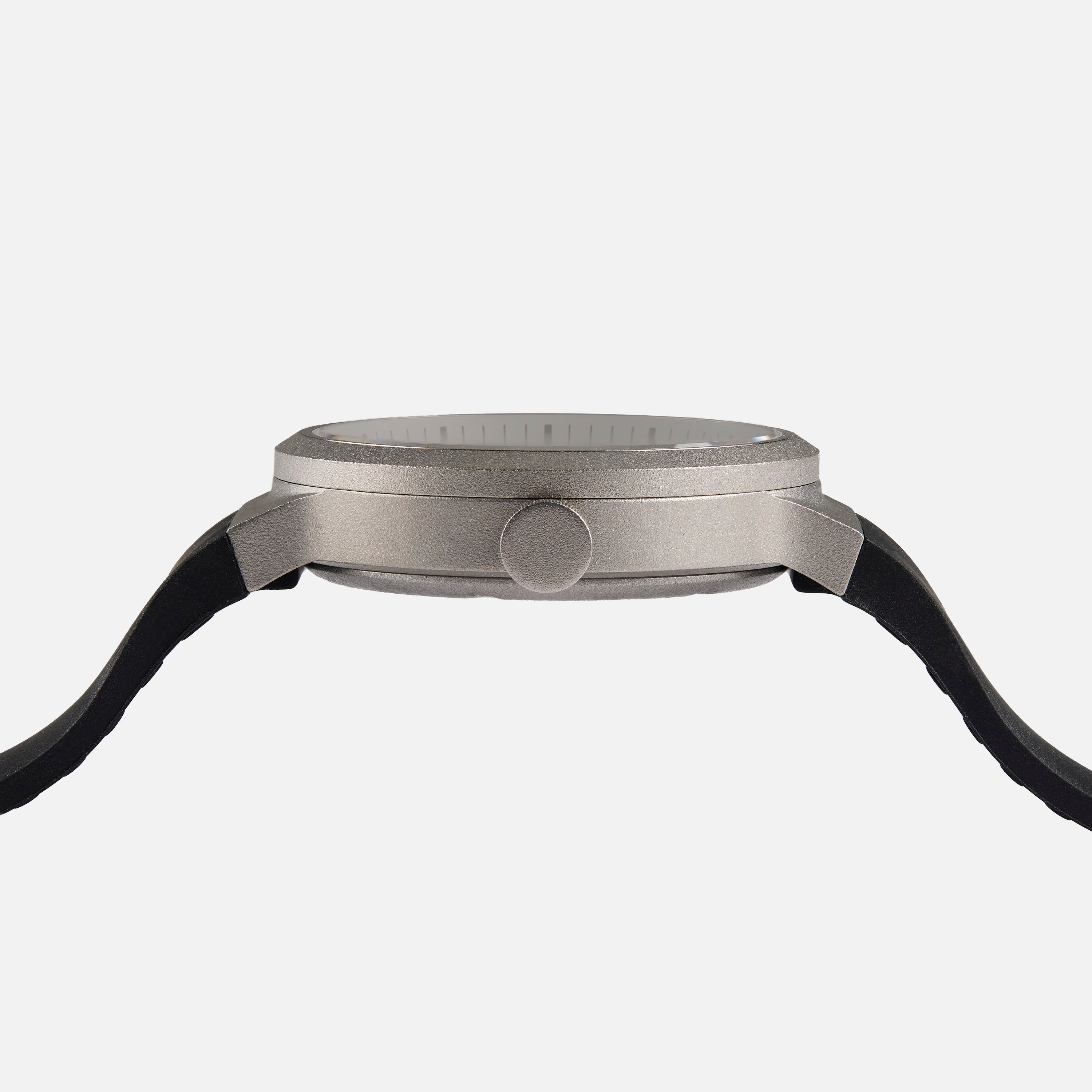 Side view of the Braun BN0279 Sub-Seconds Limited Edition For Hodinkee, featuring a round metallic case and black straps, by Braun, displayed against a white background.