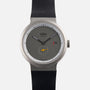 Braun BN0279 Sub-Seconds Limited Edition for Hodinkee wristwatch with a grey face, black strap, date display, and yellow detail on the small subdial.
