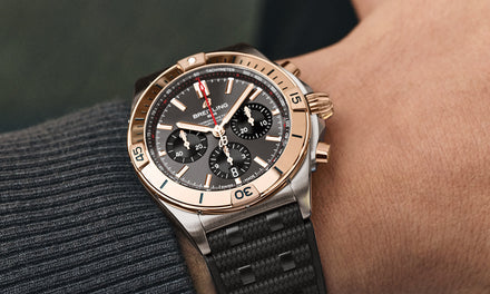 A Breitling Chronomat watch on a wrist close up