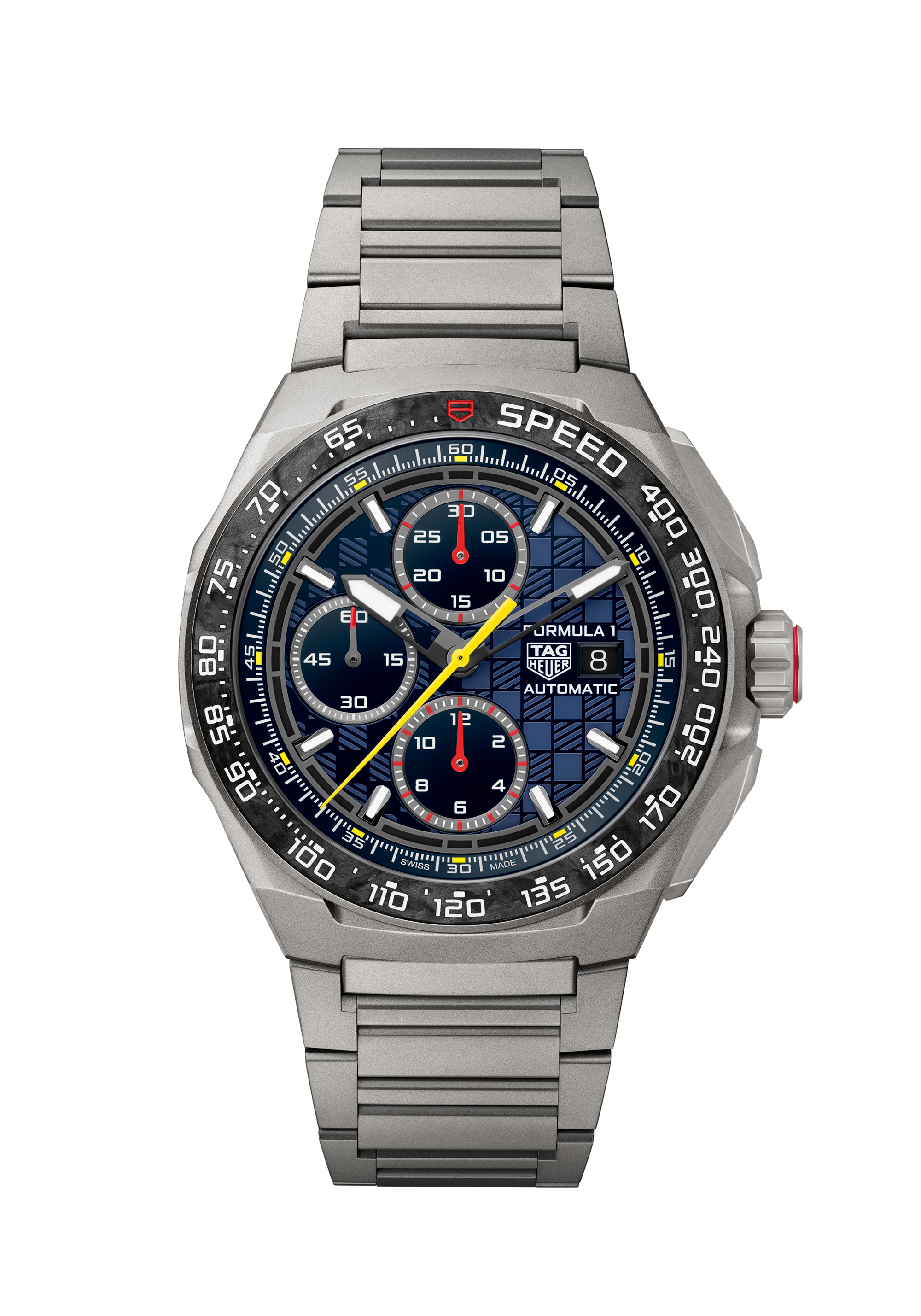 The TAG Heuer Formula 1 Chronograph features a stainless steel case, blue dial with three subdials, date window, yellow accents, and tachymeter bezel on a metal bracelet, displayed against a white background.