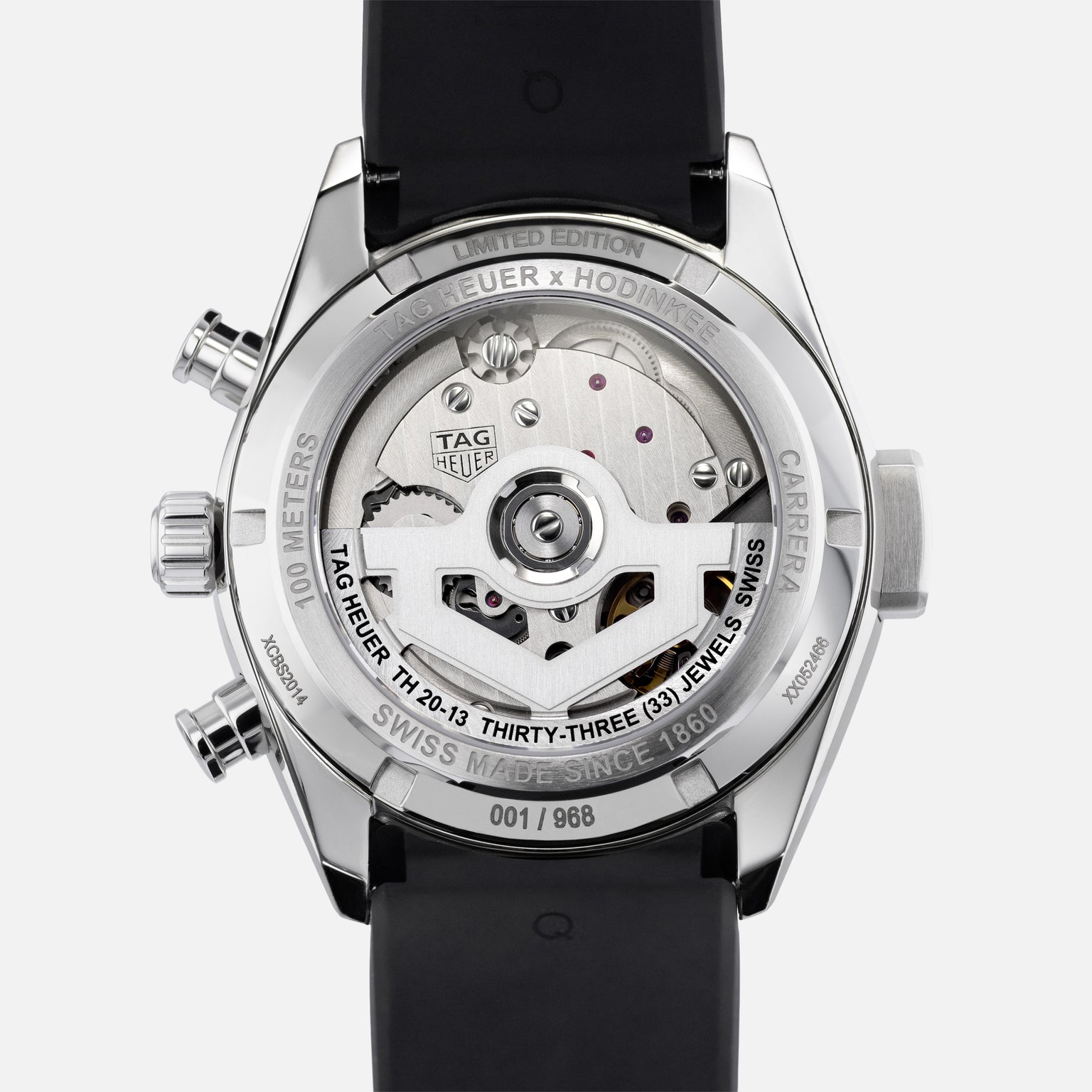 Close-up of the TAG Heuer Carrera Chronograph Seafarer × Hodinkees transparent case back, revealing the movement and special engravings.