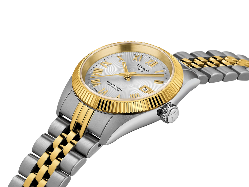 Stainless steel watch with two-tone silver and gold bracelet, round dial with gold hour markers, and date window.