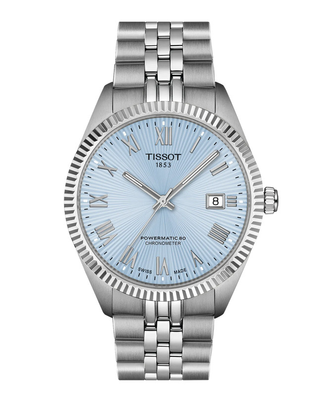 Tissot Ballade 39mm stainless steel watch with ice blue dial, Roman numerals, date window, and steel bracelet.
