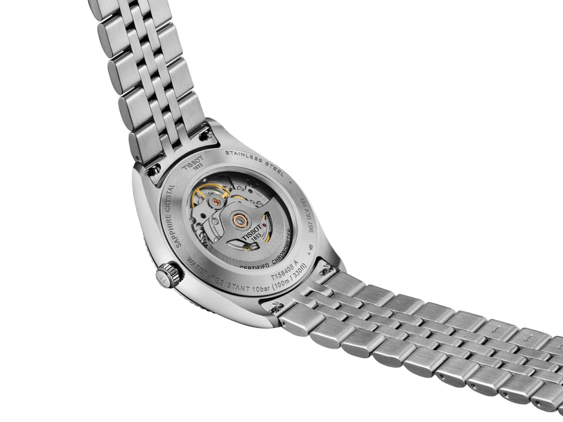 Stainless steel watch with 39mm case, ice blue dial, and three-link bracelet with visible mechanical movement through casebac