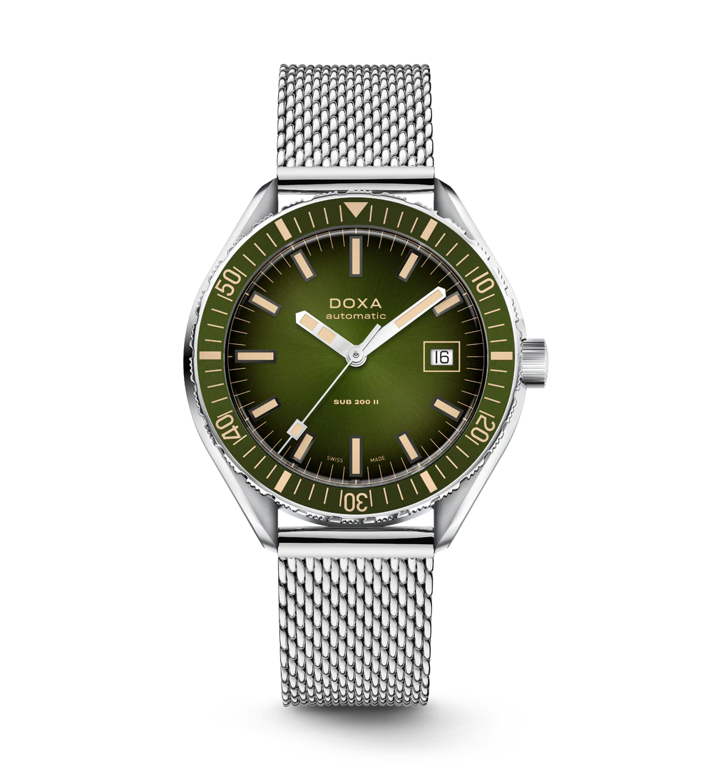 DOXA watch with green dial and silver mesh band on a white background