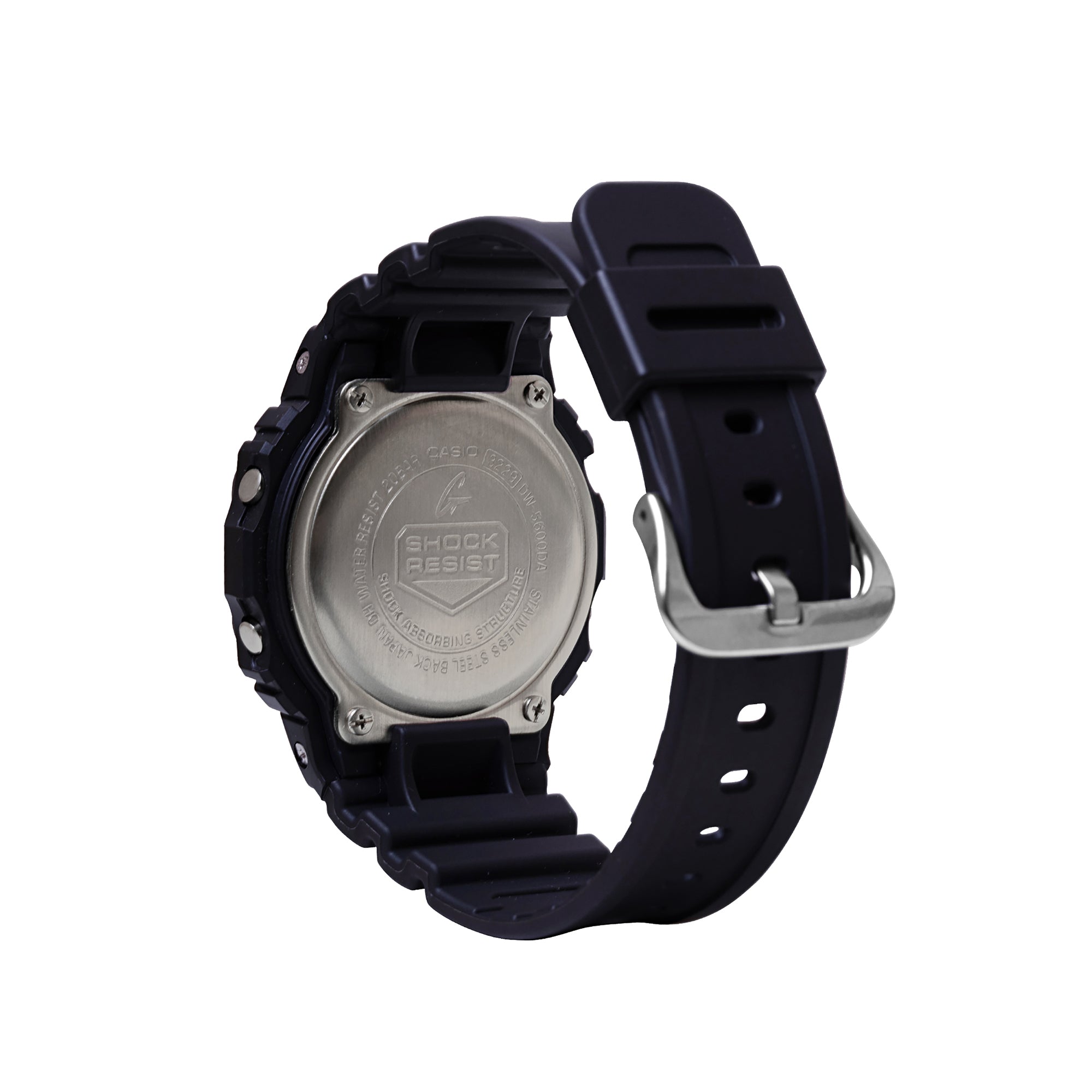 Black resin digital watch with metal caseback, black band with metal buckle, shown from rear view.