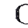 Black digital watch with textured resin case, square face, metal buttons, and matching black resin band shown from side view.