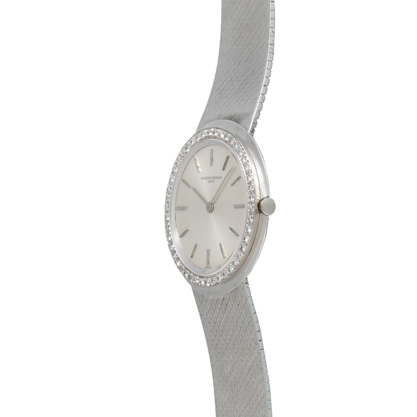 Side view of the Vacheron Constantin White Gold Diamond Bezel wristwatch featuring a diamond-set bezel and textured metal band.