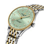 Breitling Navitimer 32mm watch with mint green dial, diamond hour markers, yellow gold and stainless steel two-tone bracelet.
