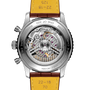 Watch with yellow leather strap and visible mechanical components on a white background