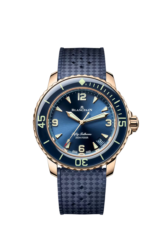 Blancpain watch with sunburst blue dial, rose gold case, dark blue bezel, luminous hands and hour markers, and textured blue 