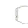 White resin digital watch with square case, metal buttons, and textured band shown from the side.