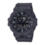 Gray G-Shock analog-digital watch with shock-resistant resin case, dual time display, and illuminated dial.