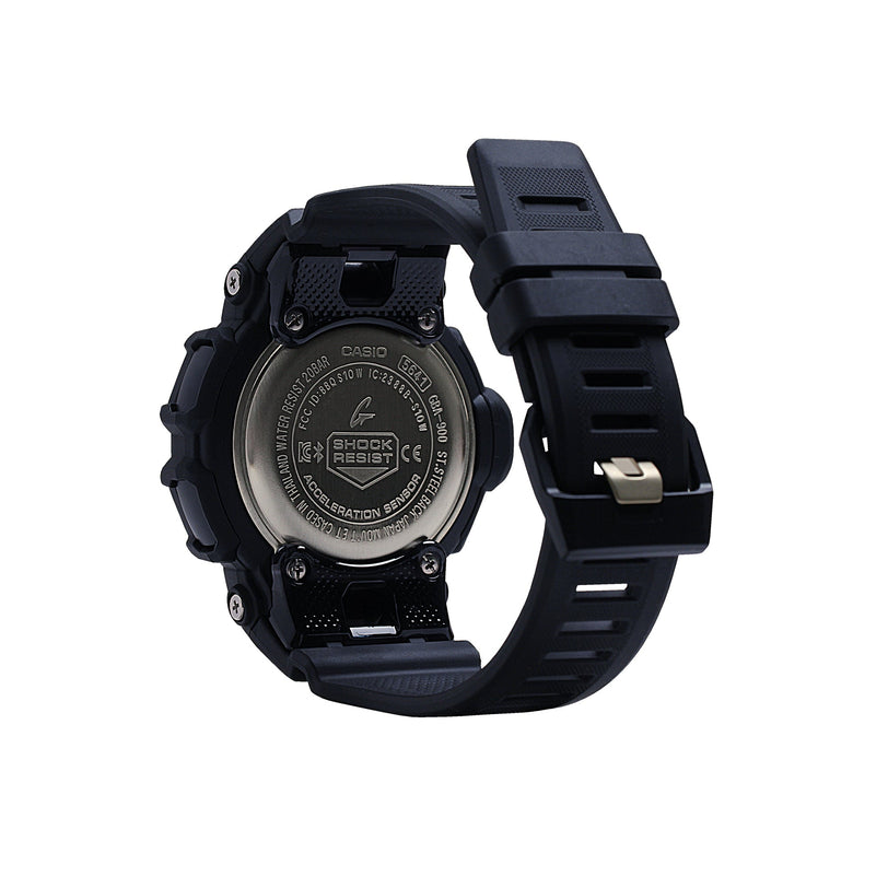Black G-Shock digital watch with resin band and metal case back displaying shock resistant specifications.