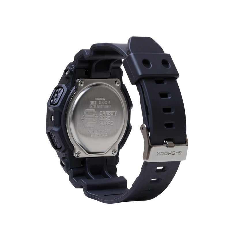 Black digital watch with resin case, rectangular face, metal back plate with Carbon Core Guard branding, and black rubber str