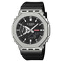 G-Shock GM-2100M-1A watch with silver stainless steel case, textured bezel, black dial, and black resin band.