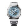 Silver stainless steel G-Shock watch with light blue dial, digital display, and metal bracelet.
