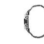 Digital watch with silver stainless steel case and black resin band, shown from the side profile.