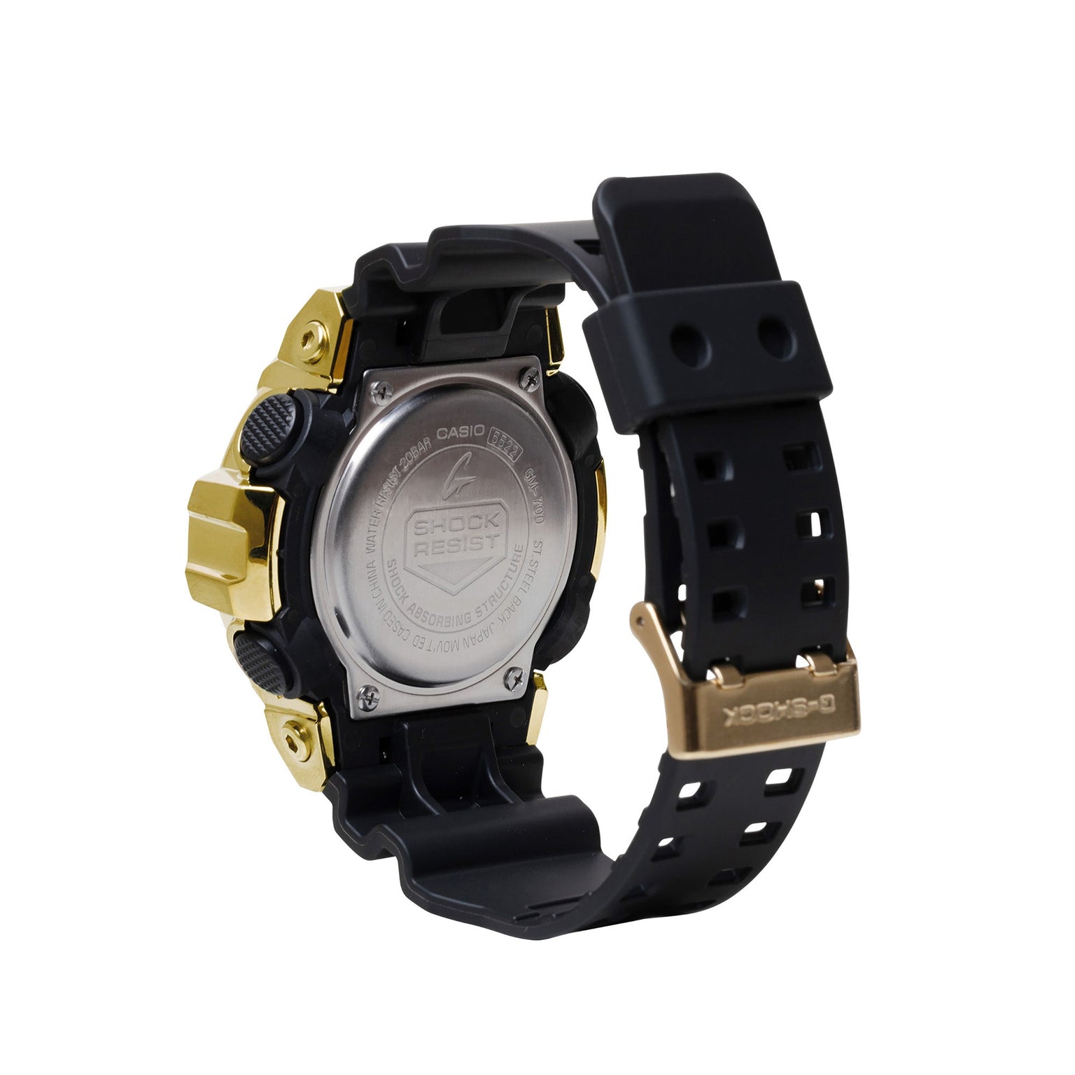 Digital watch with black resin band, gold and silver-tone stainless steel case, and square face shown from back view.