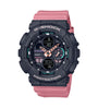 Black and pink G-Shock analog-digital watch with orange hands and digital displays on resin band.