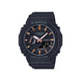 Black G-Shock digital-analog watch with orange accents, black resin band, and dual display showing time and date.