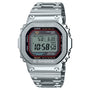 Silver stainless steel G-Shock digital watch with square face, black bezel with red accents, and metal band.