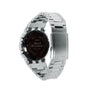 Silver stainless steel digital watch with black dial, square face, and metal link band shown from back view.