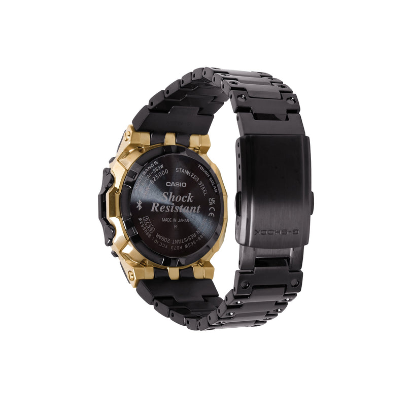 Black and gold stainless steel digital watch with black resin band and shock-resistant design.