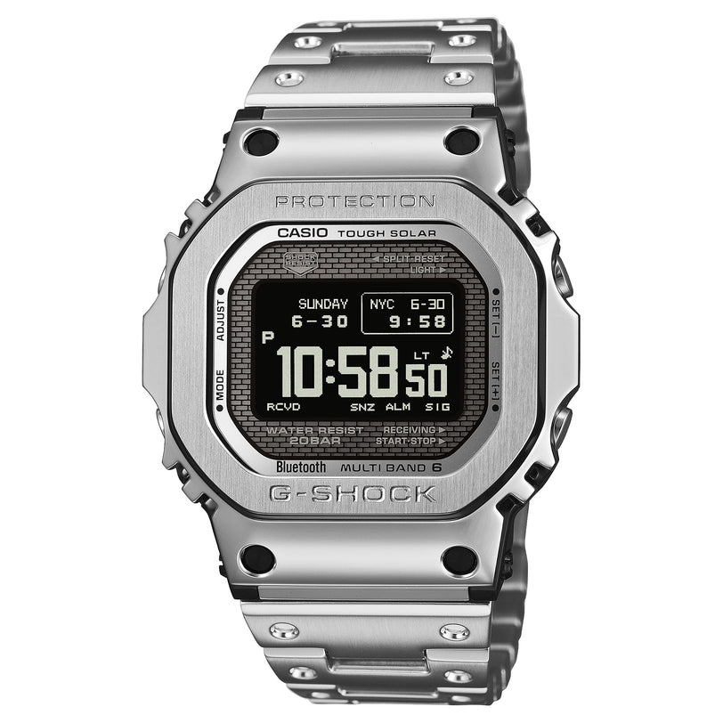 Silver stainless steel G-Shock digital watch with square face, displaying time 10:58, featuring solar power and multi-band co