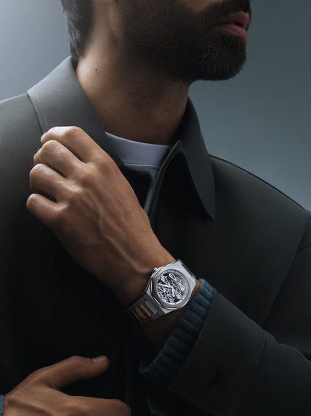 GP WOS Exclusive shown on mans wrist