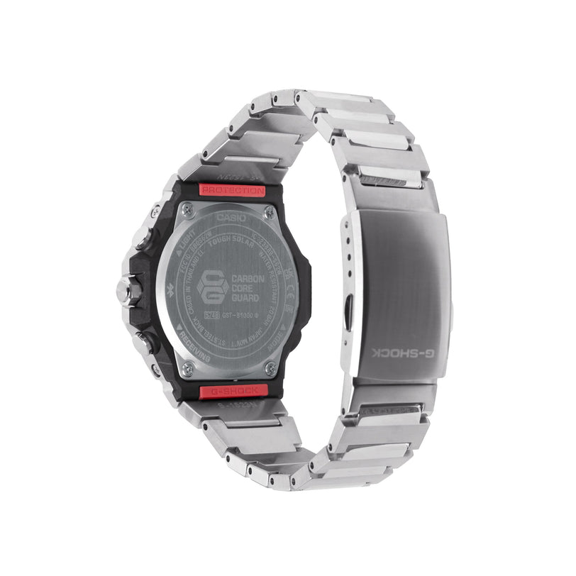 Digital watch with black bezel, red accents, silver stainless steel band, and carbon core guard on back case.