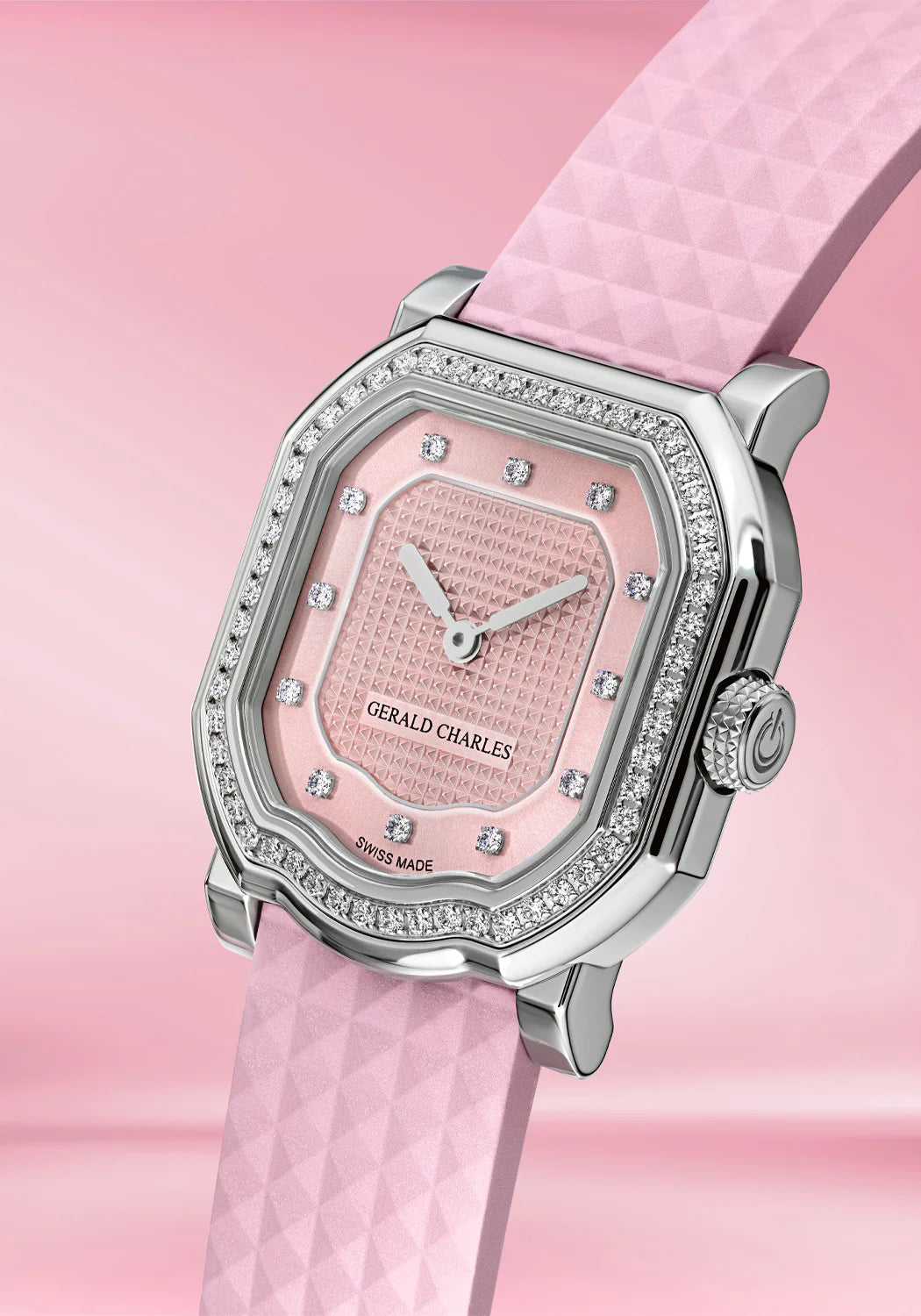 Pink watch with diamond accents on a pink background
