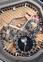 Close-up of a detailed watch mechanism with 'Gerald Charles' branding.