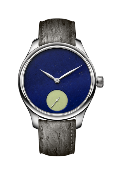 Stainless steel watch with dark blue dial, small seconds subdial, white hands, and gray textured leather strap.
