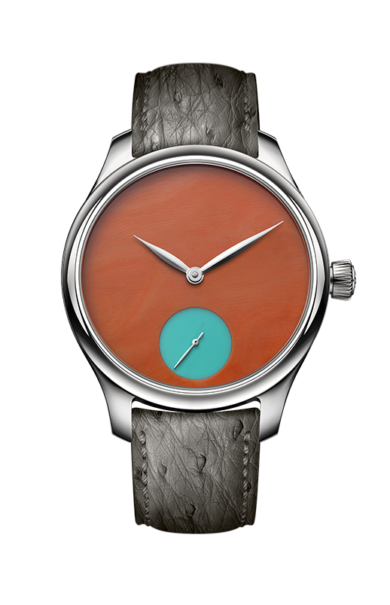 Silver-tone watch with rust-orange dial, turquoise small seconds subdial, and dark textured leather strap.