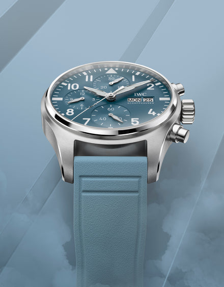 Blue IWC watch on blue background 