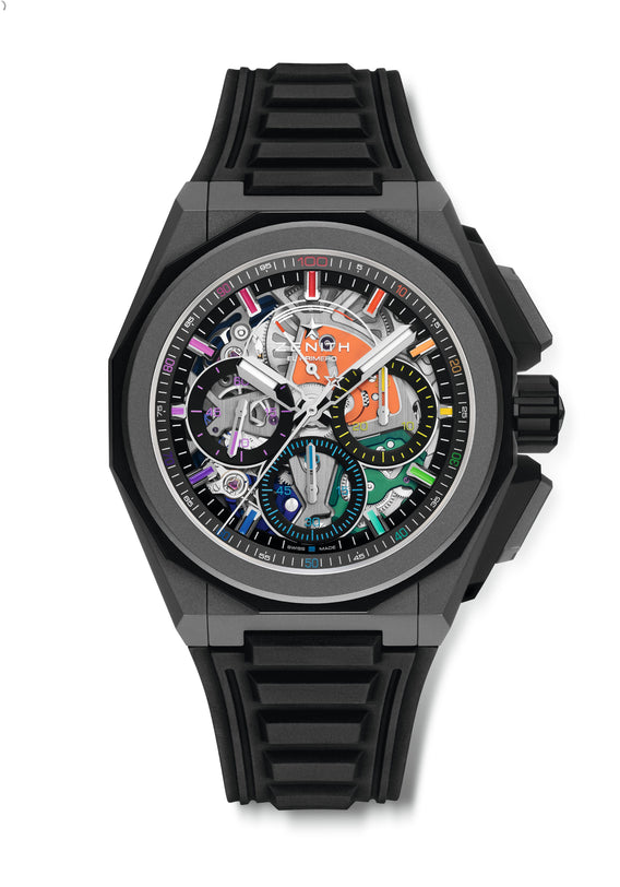 The Zenith Defy Extreme Chroma is a modern wristwatch with a black case and strap, showcasing a colorful skeleton dial and intricate gears, powered by the El Primero 9004 microblasted titanium chronograph movement.