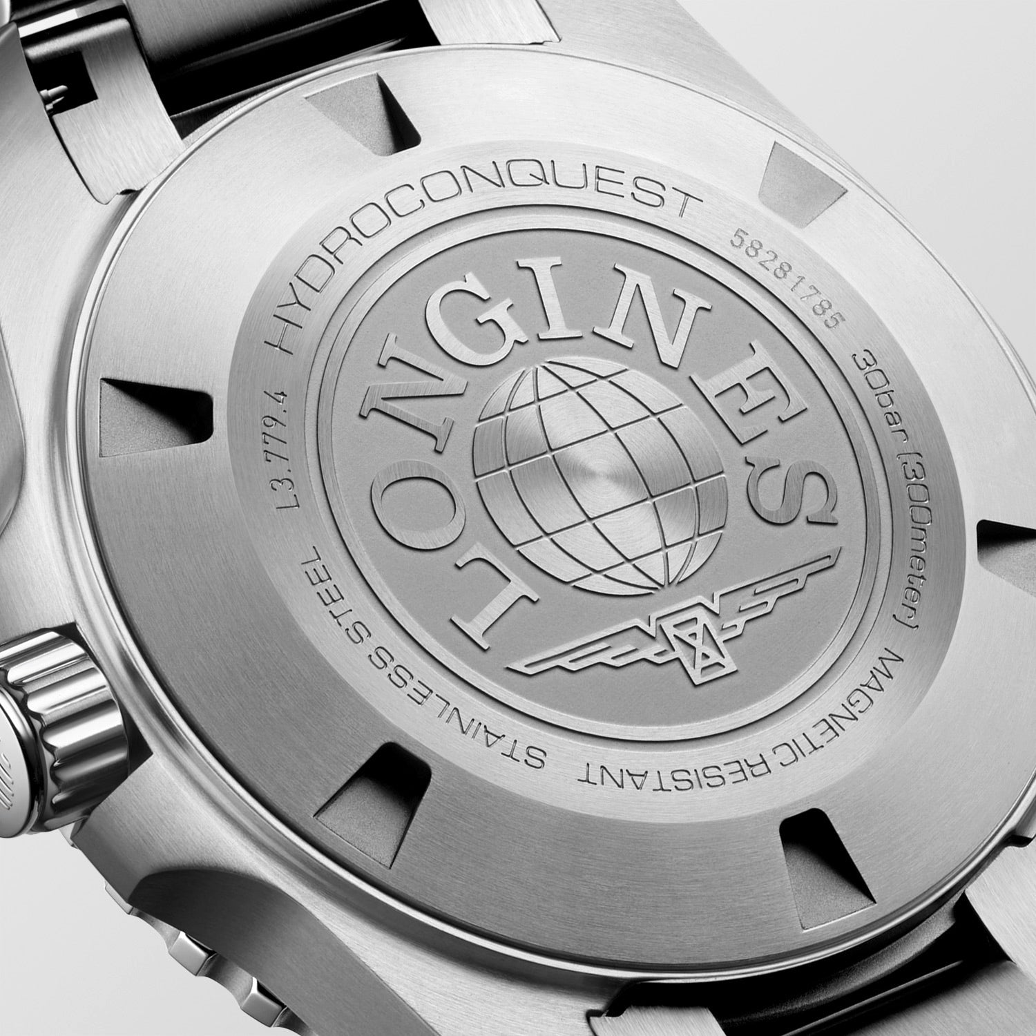Close-up of a watch with Longines logo on a white background