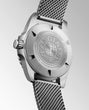 Silver watch with mesh band and visible brand logo on a light gray background