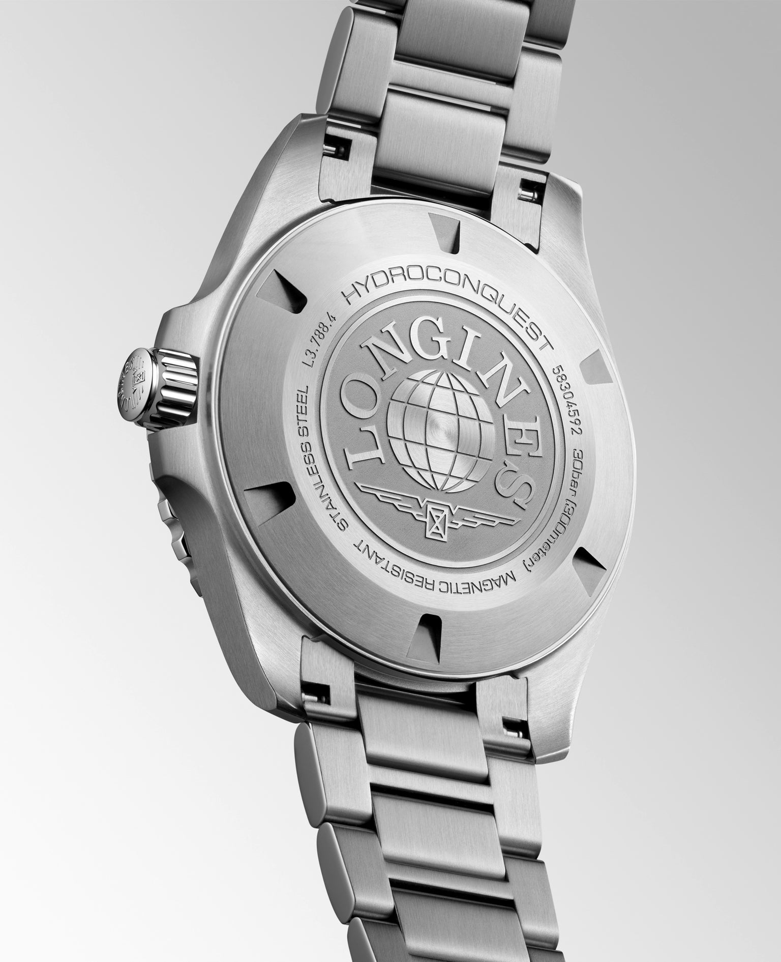 Silver watch with brand logo on a light gray background